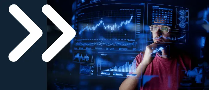 Economista con énfasis en análisis de datos trabaja en entorno empresarial y revisa gráficos en pantalla